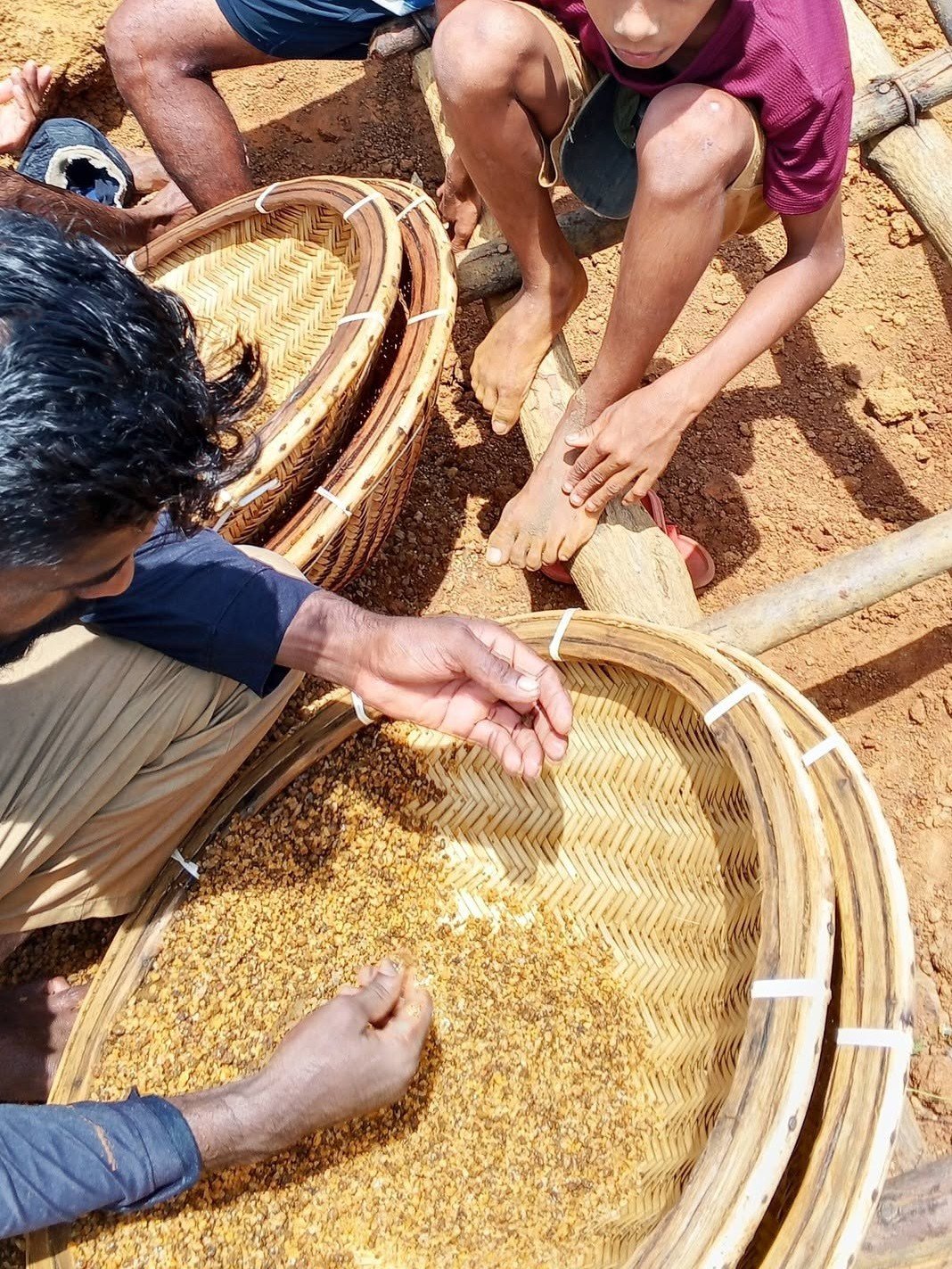 Traditional gem mining techniques in Sri Lanka - manual pit mining and gem washing